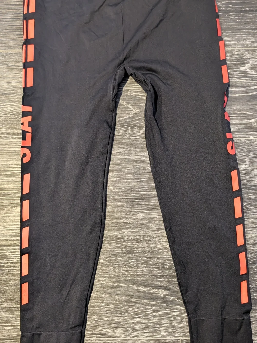 Black Leggings with Orange Side Graphic
